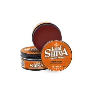 Pomada Power Brilho Lord Shiva aberta mostrando a textura interna translúcida laranja e embalagem premium laranja